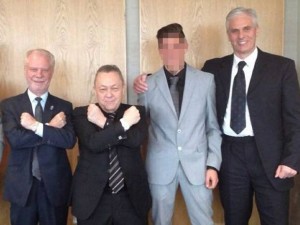 West Ham United co-owners David Gold and David Sullivan give the Hammer salute flanked to the right by crime boss David Hunt